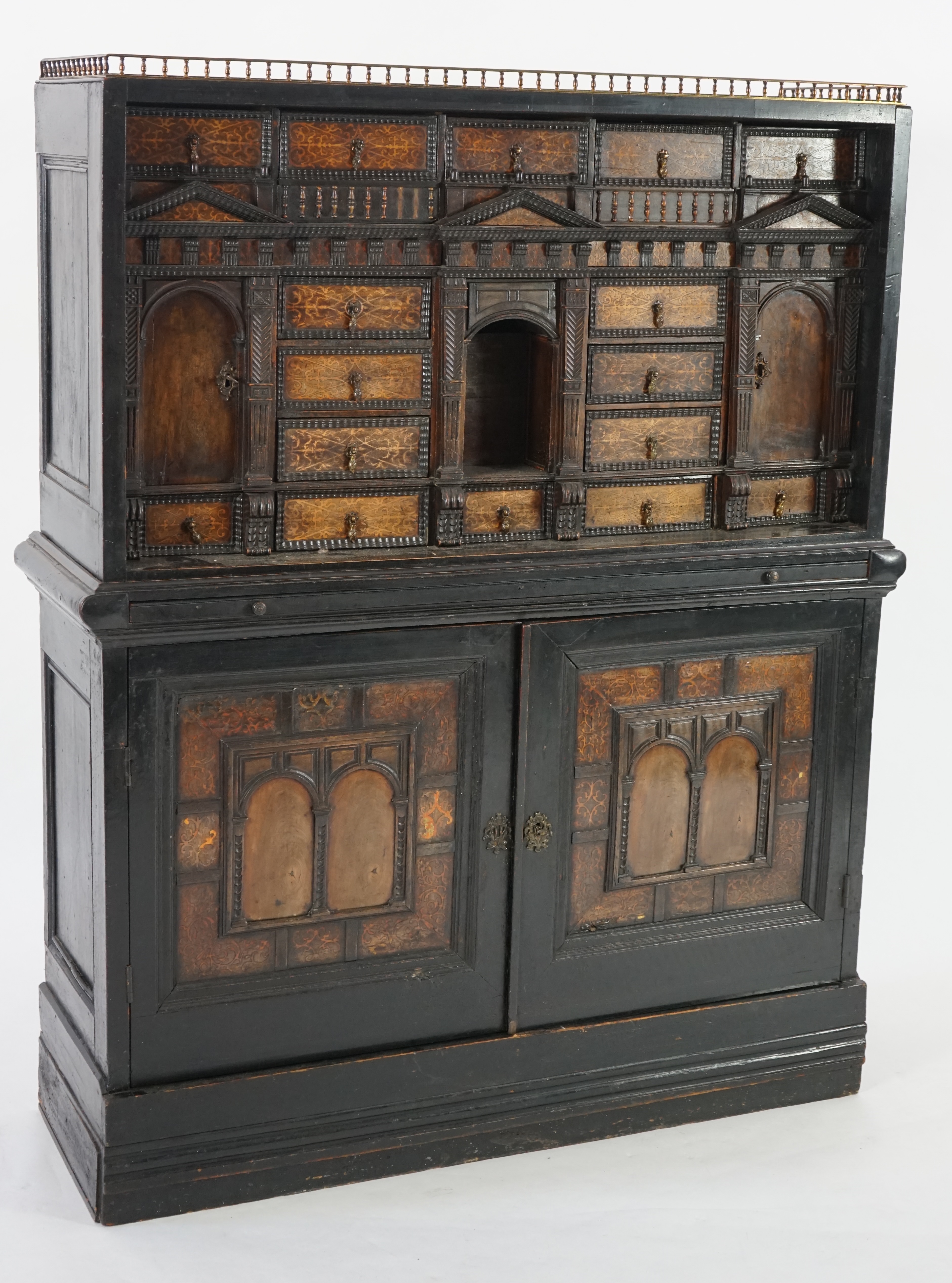 An 18th century and later Dutch walnut ebonised and marquetry inlaid collector's cabinet on stand